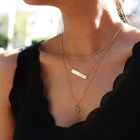 three necklaces . Layered necklaces 