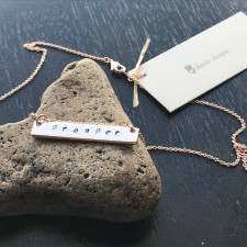 The Ultimate Guide to Our Hand Stamped 'Prosper' Rose Gold Bar Necklace